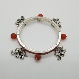 silver orange stretch bracelet with elephants